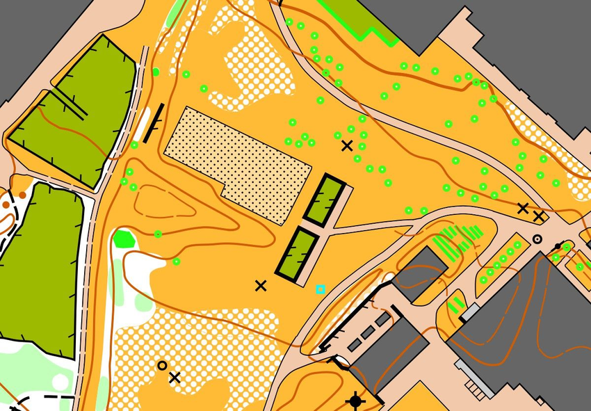 Kart med grå områder i tre hjørner, og et stort gult felt i midten, med flekker av hvitt. Det er noen større grønne områder til venstre, og så er det tre firkantede felter midt i det gule. To av dem er grønne med sort kant, og ett er større og beige med sorte prikker. 